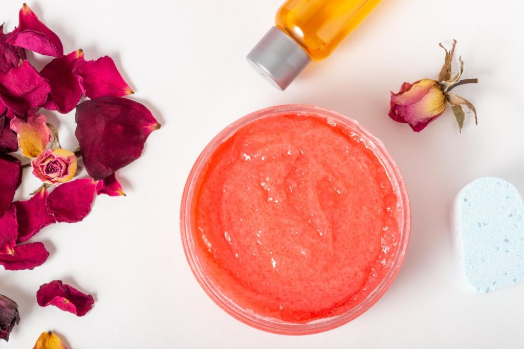 Jar of cosmetic body scrub with rose petals Natural cosmetic Home cosmetics